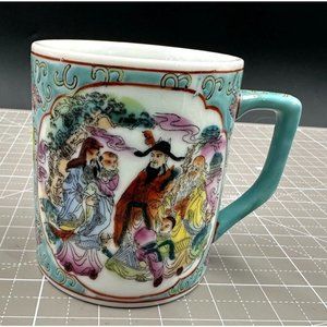 Vintage Hand Painted Porcelain Chinese Tea Cup Teal Background